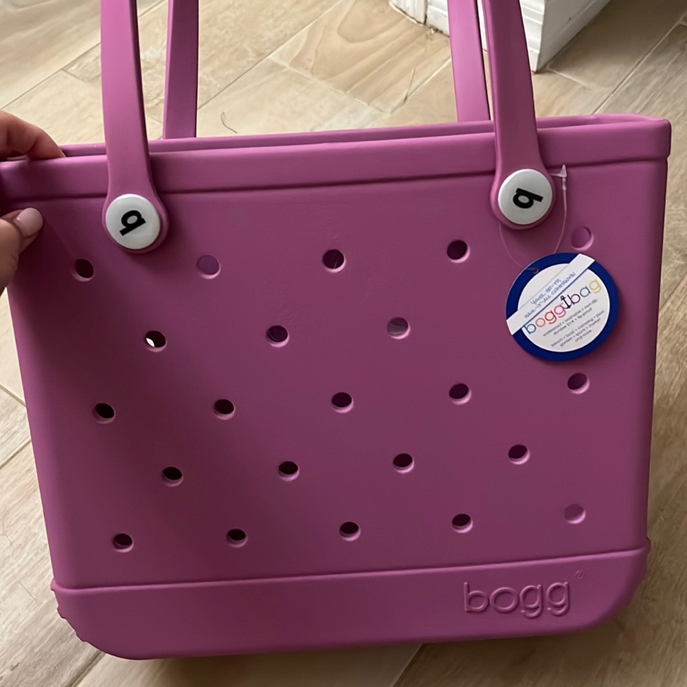 Brand new with tags Bogg Bag! Washable & Light purple. Durable & multipurpose